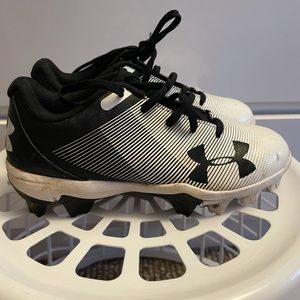 size 12k Under Armour baseball cleats.